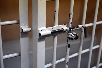 The latch on the temporary detention cell in the police Department